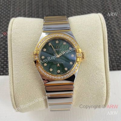  High Quality Replica OMEGA New Constellation Diamond Quartz Ladies' Watch Silver Electroplated Metal Strap Emerald Green 3D Meteor Pattern 12 Gemstones Inlaid Face Dial 36 Natural Diamonds Inlaid Case Watch 27mm